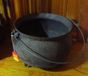 Small 3-Legged Potbellied Cast Iron Kettle With Bail At The Yard Sale